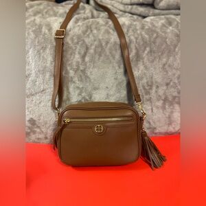 Iman crossbody purse. Never worn. NWOT